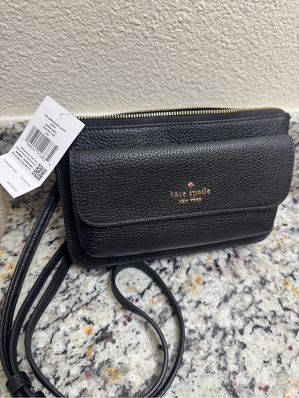 kate spade black pebbled leather crossbody with gold logo